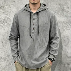 Men's casual long sleeve hooded linen shirt detail showing buttons and drawstring design.