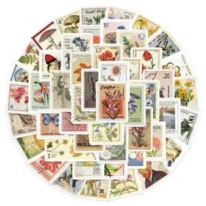 Vintage botanical and butterfly stamp stickers detail view for DIY journal decoration.