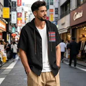 Men's casual summer linen hooded short sleeve shirt detail shot in urban street scene.