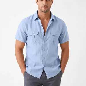 Close-up of men's light blue linen short-sleeve shirt featuring lapel and dual chest pockets.