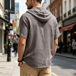 Detailed view of grey men linen hooded short sleeve t-shirt in outdoor street.
