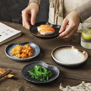 Creative Japanese style ceramic heart-shaped appetizer plates for sushi and snack serving