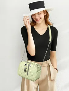 Stylish light green quilted crossbody bag for women, featuring soft leather and chain strap.