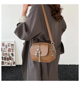 Brown PU leather crossbody shoulder bag with metal tassel chain and cute bear pendant for women
