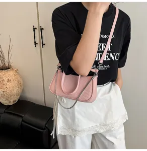 Pink woven underarm bag with metal chain strap versatile small crossbody bag for women