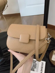 Elegant textured PU leather crossbody shoulder bag with flap closure for daily uses.
