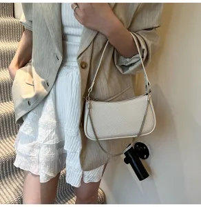 Chic white textured women shoulder bag with stylish chain strap, perfect for daily wear.