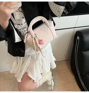 Pink litchi pattern mini boston handbag, stylish sweet shoulder crossbody bag for women.