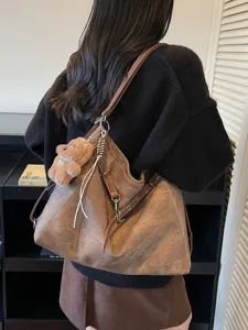 Vintage distressed canvas shoulder bag for women, retro casual daily crossbody tote handbag.