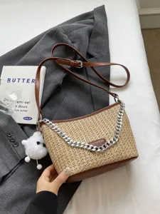 Stylish straw woven crossbody bag with PU leather trim and metal chain for women summer.