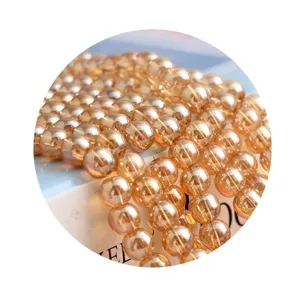 Electroplated champagne gold crystal glass beads for DIY jewelry making, shiny round beads.