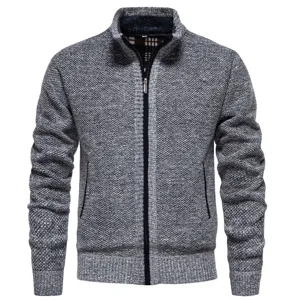 Mens textured knit cardigan sweater detail featuring stand collar and zip closure.