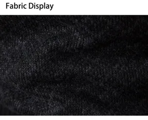 Primer plano de tejido de punto negro que muestra textura fina y material suave de invierno.