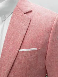 Close-up of pink men's cotton linen blazer lapel and pocket detail, elegant texture.