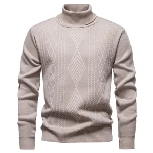 Men's cable knit turtleneck sweater detail, thick warm winter pullover with diamond pattern.