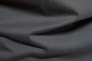 Men's casual solid color cotton t-shirt dark gray soft fabric close-up detail texture.
