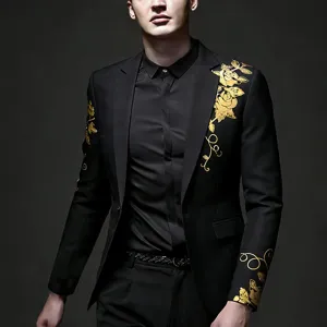 Details of the men's slim fit suit jacket featuring elegant gold floral print for wedding parties.