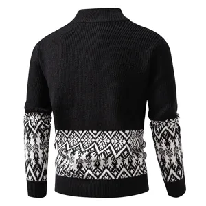 Back detail of men's black knit sweater featuring geometric ethnic patterns on sleeves and hem.