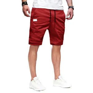Men's casual red shorts detail shot, comfortable breathable fabric, adjustable drawstring design.
