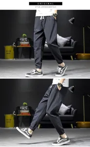 Men casual jogger pants detail view, loose fit linen harem trousers, comfortable spring wear.