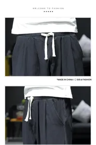 Men's casual loose linen harem trousers with drawstring waist, comfortable breathable summer pants.