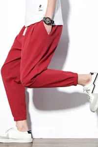 Men's casual loose red linen harem joggers cuffed sports trousers studio display main