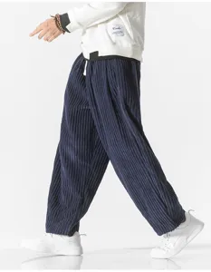 Men's casual corduroy harem pants side detail showing loose straight fit and comfortable fabric.