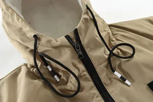Men's winter jacket hood detail, khaki hooded coat close-up, cozy fleece lining and zipper.