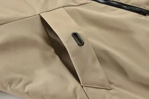 Close-up detail of men's winter jacket pocket, khaki fabric, neat stitching and zipper.