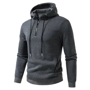 Close up detail of dark grey mens casual hoodie zipper and hood drawstring features.