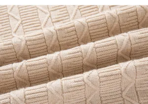 Men's casual knitted sweater fabric detail, soft cable knit texture for autumn winter.