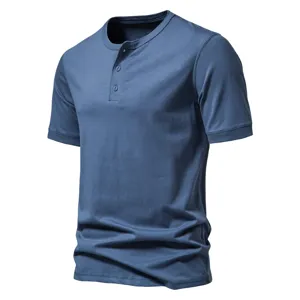Men's solid blue short sleeve Henley shirt close-up, classic button placket detail, breathable fabric.