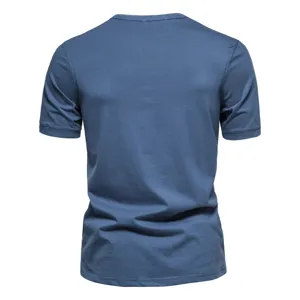 Back view of solid blue men's short sleeve t-shirt, casual cotton summer top detail.