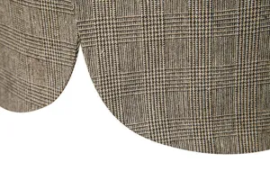 Dettaglio tessuto blazer casual da uomo in lana, con classico motivo a quadri e orlo pulito.