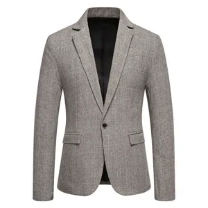 Dettaglio blazer casual grigio a quadri da uomo, giacca monopetto vintage con risvolto.