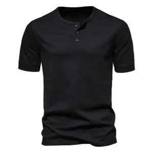 Close-up of mens black short sleeve Henley shirt with button placket and ribbed cuffs.