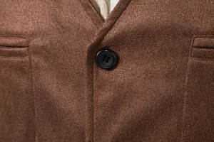 Men suede vest detail view showcasing V-neck design and classic black button closure.