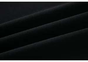 Close-up view of black fabric texture showing fine weave and soft folds for clothing details.