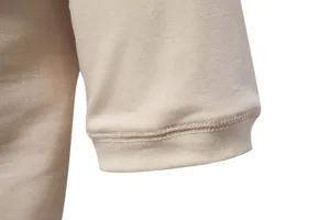 Close-up detail of the ribbed sleeve cuff on a casual men's plain cotton short sleeve t-shirt.