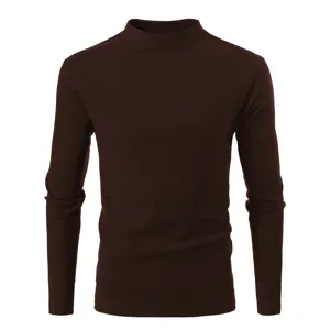 Dark brown thermal mock turtleneck long sleeve shirt detail view soft fleece texture fabric.
