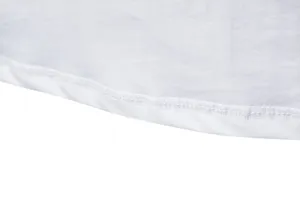 Close-up detail of white cotton mens t-shirt hem stitching, fine workmanship and quality.