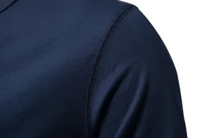 Detail view of a solid navy blue men's short sleeve t-shirt, showing fine shoulder stitching.