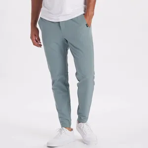 Men's slim fit casual jogger pants detail view, lightweight stretch fabric for daily comfort.