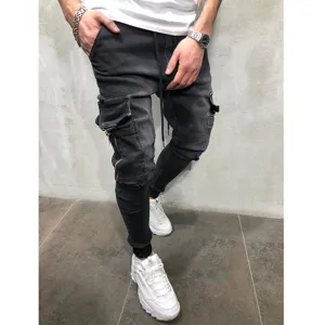 Men's dark wash cargo denim jogger pants with multiple pockets and cuffed hems stylish