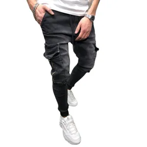 Men's washed black cargo denim jogger pants with side pockets and zippers for casual wear.