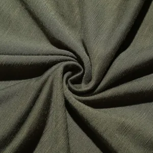 Dunkelgrüne Stoffstruktur Nahaufnahme Detail, weiches atmungsaktives Material mit feinem Gewebe.