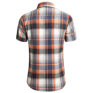 Back view detail of men short sleeve casual plaid shirt showing neat tailoring and grid pattern.
