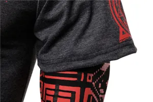 Men's stretch fitness long sleeve t-shirt ninja costume sleeve close-up detail in dark grey.