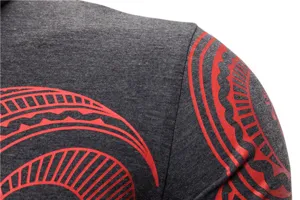 Men's long sleeve fitness shirt detail view, stretch athletic top with red tribal print.