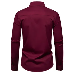 Men's long sleeve dress shirt back detail in wine red, casual solid color slim fit top.